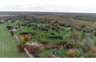 Property photo 1 - ROGUE RIVER GOLF CLUB AUCTION - 144+/- ACRES IN 13 TRACTS IN KENT COUNTY, MICHIGAN
